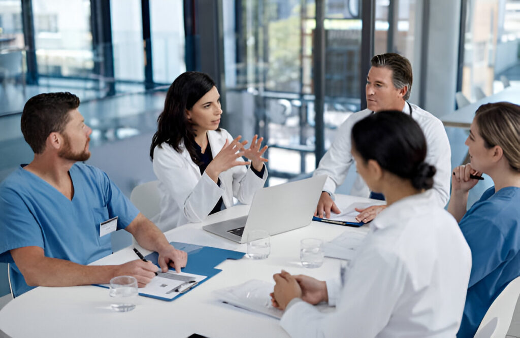 Diverse team of smiling healthcare professionals collaborating at Wellspan Health, representing rewarding Wellspan jobs.