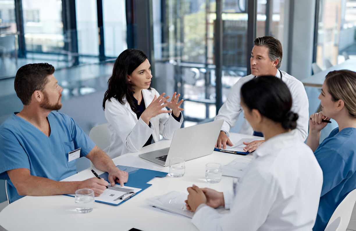 Diverse team of smiling healthcare professionals collaborating at Wellspan Health, representing rewarding Wellspan jobs />
    <link href=